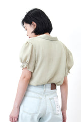 Green v neck blouse in elastic sleeves