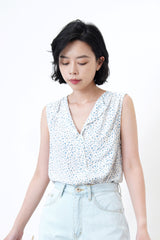 Light blue floral v neck vest