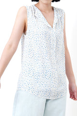 Light blue floral v neck vest