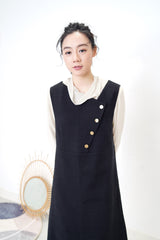 Black vest dress in buttons detail