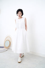 White vest dress with cross layer details