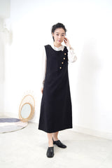 Black vest dress in buttons detail