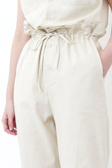 Beige overall w/ frill waist details