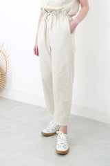 Beige overall w/ frill waist details