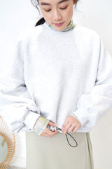 light grey pullover w/ elastic string hem