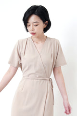 Beige v neck jumpsuit w/ side waist strings