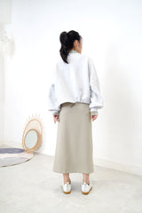 Green h cut skirt w/ string waist details