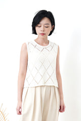 Ivory crochet vest in diamond pattern