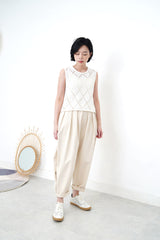 Ivory crochet vest in diamond pattern