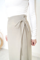 Green h cut skirt w/ string waist details