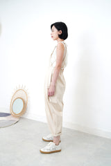 Ivory pleats trousers w/ straps