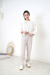White linen blouse in peplum hem