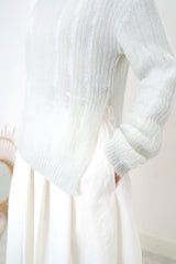 White A cut flare skirt in fringe trimming