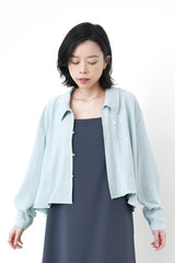 Baby blue crop blouse in asymmetric buttons