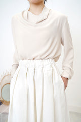 White A cut flare skirt in fringe trimming