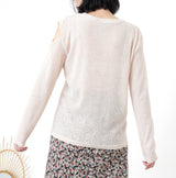 Ivory top in cut out sleeves detail