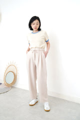 Ivory pencil cut pants w/ string detail