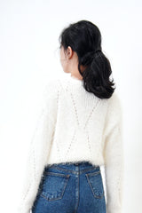 Ivory fluffy knit top in crochet detail