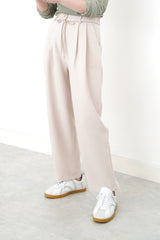 Ivory pencil cut pants w/ string detail