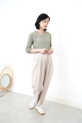 Ivory pencil cut pants w/ string detail