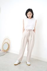 Ivory pencil cut pants w/ string detail
