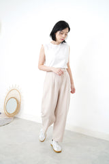 Ivory pencil cut pants w/ string detail