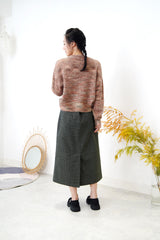 Dark green skirt in checked pattern