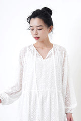 white sheer dress in diamond pattern with cami inner