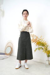 Dark green skirt in checked pattern
