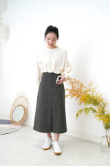Dark green skirt in checked pattern