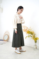 Dark green skirt in checked pattern