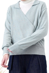 Light blue knit top in overlap v neck cut