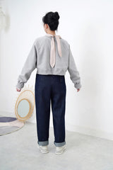 Grey crop cut pullover in stepped hem