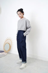 Grey crop cut pullover in stepped hem