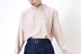 Dusty pink blouse in detail tie neck stand collar
