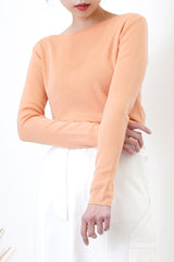 Peach knit boat neckline top