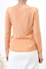 Peach knit boat neckline top