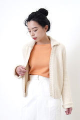 Peach knit boat neckline top
