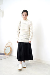 Ivory sweater in wavy crochet pattern