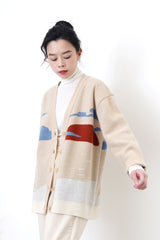 Beige wool oversized cardigan in painting