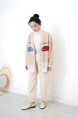 Beige wool oversized cardigan in painting