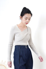 Grey knit top in overlay wrap style