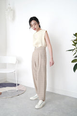 Beige checked trousers in waist detail