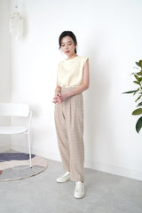 Beige checked trousers in waist detail