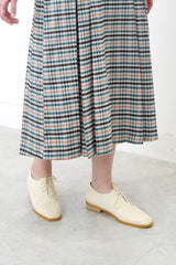 Spring checked skirt in pleats