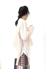 Cream crop pullover in shirt layering