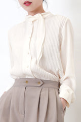 Ivory chiffon texture blouse in detail collar