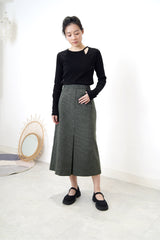 Dark green skirt in checked pattern