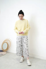 Pastel yellow pullover in crop cut