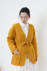 Orange knit jacket w/ waist strap